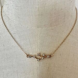 Gold tone rhinestone Leo constellation zodiac necklace